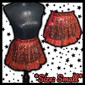 NWOT: DOLLS KILL - FIRE CHASING STARLIGHT VINYL SKIRT (SIZE SMALL)